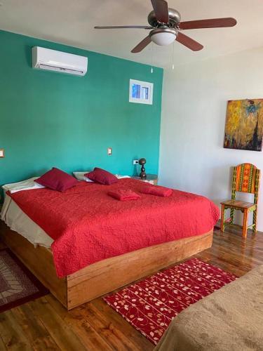 Foto de una habitación de Hotel La Casa Rosada
