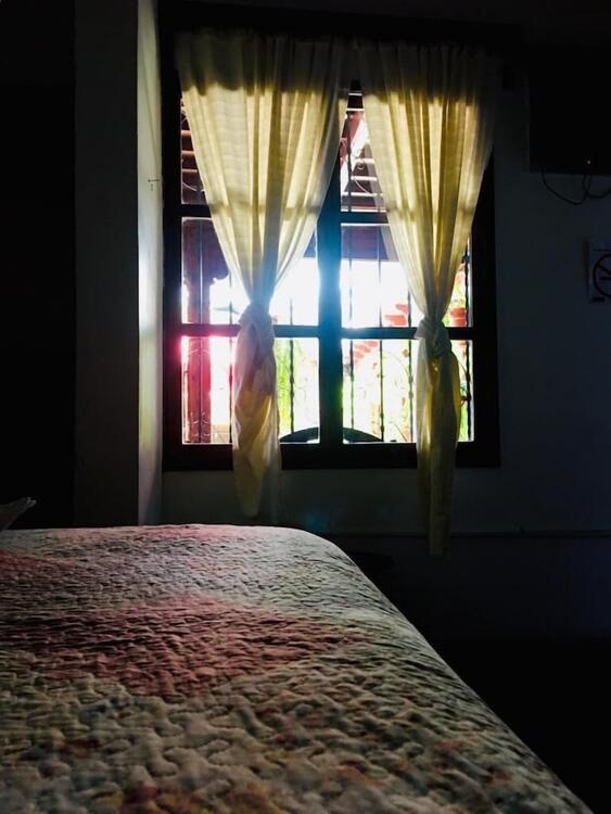 Foto de una habitación de Hotel Dionisio Inn