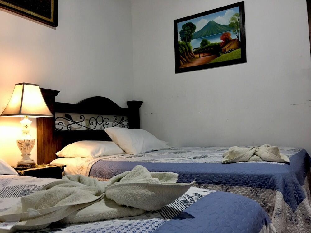 Foto de una habitación de Hotel Dionisio Inn
