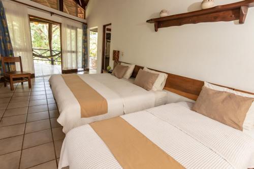 Foto de una habitación de Hotel Cabinas Las Olas