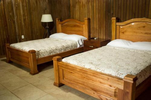 Foto de una habitación de Hotel Tenamit Maya