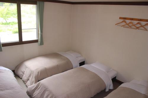 Foto de una habitación de Hakuba Goryu Pension Kurumi