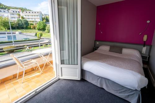 Foto de una habitación de Hôtel du Soleil Levant