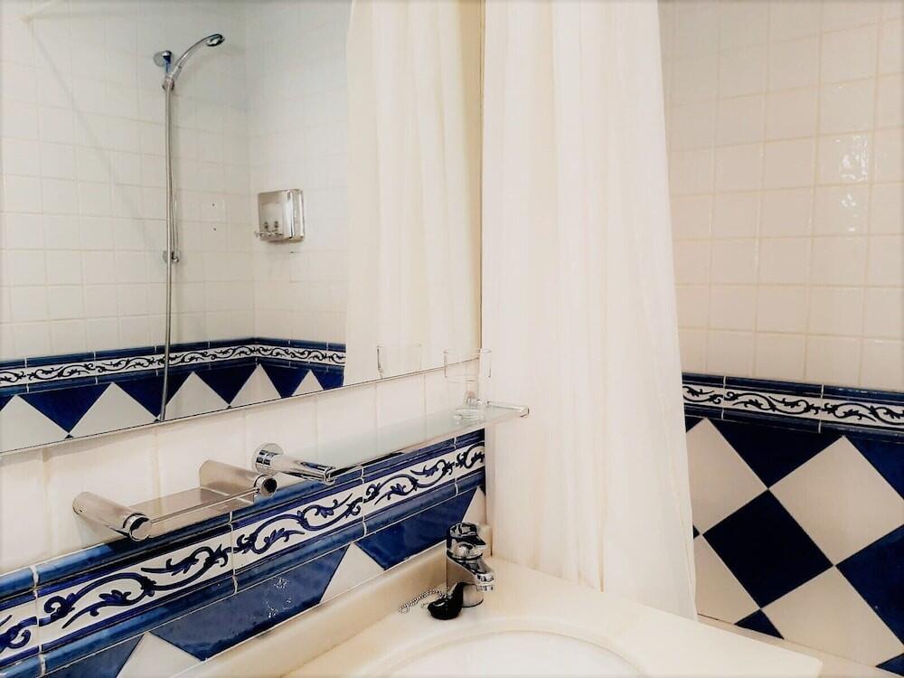Foto del baño de Hosteria Sara by gaiarooms