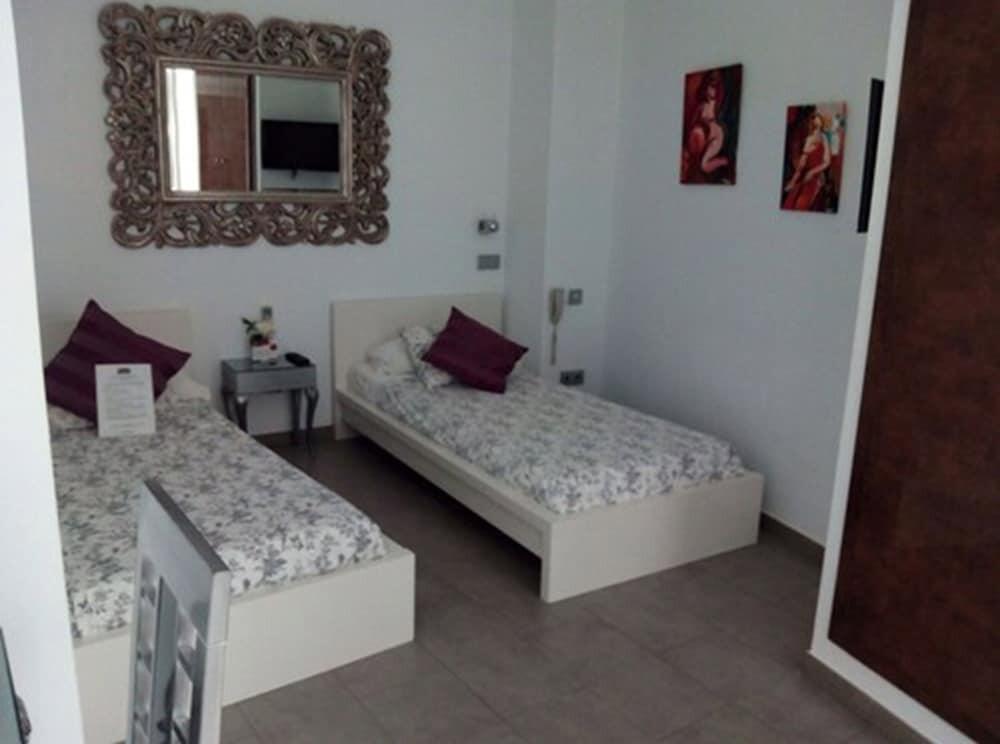 Foto de una habitación de Hotel Palacio Alcázar