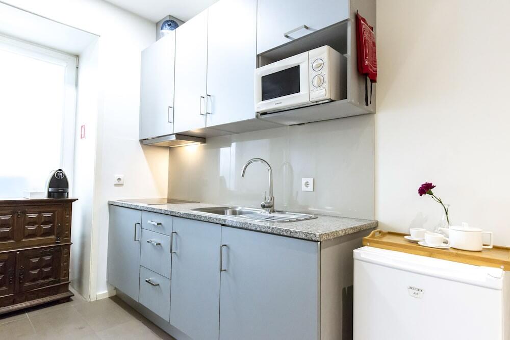 Foto de una habitación de Historical Center - Taipas Apartments