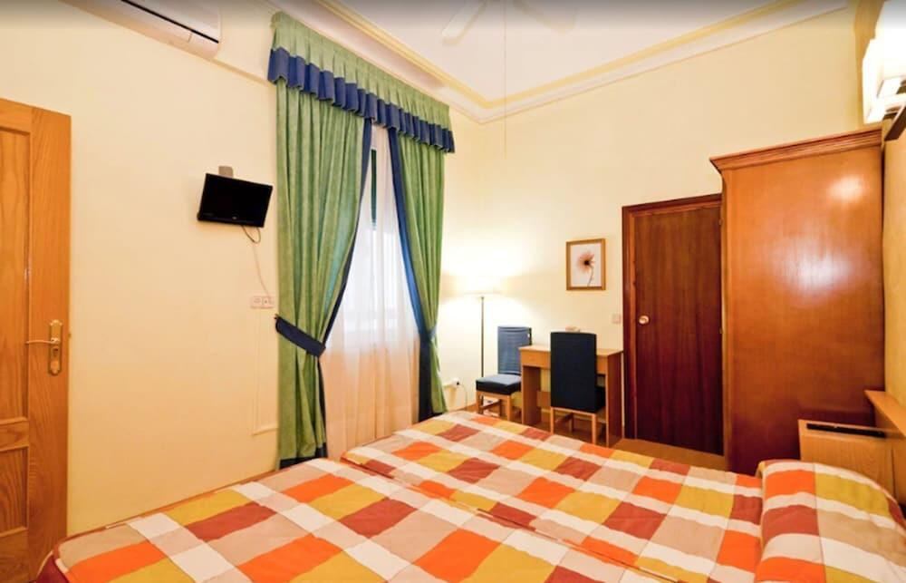 Foto de una habitación de Hostal Oporto
