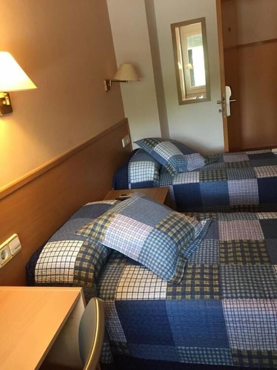 Foto de una habitación de Hostal Rio De Castro