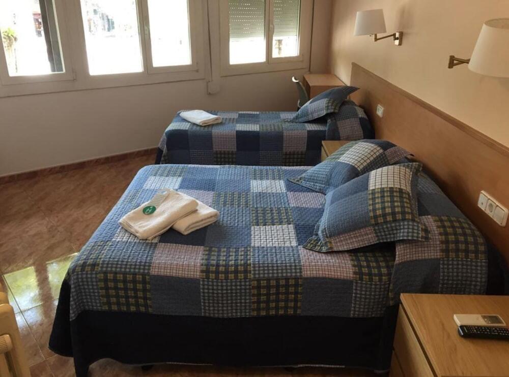 Foto de una habitación de Hostal Rio De Castro