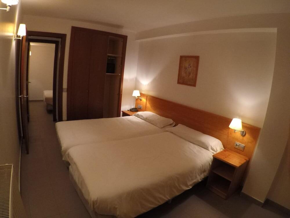 Foto de una habitación de Apartamentos Turísticos Roc Del Castell