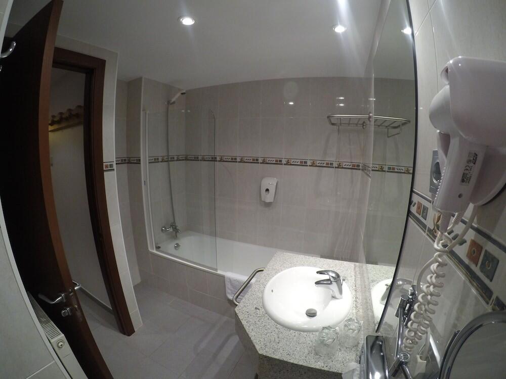 Foto del baño de Apartamentos Turísticos Roc Del Castell