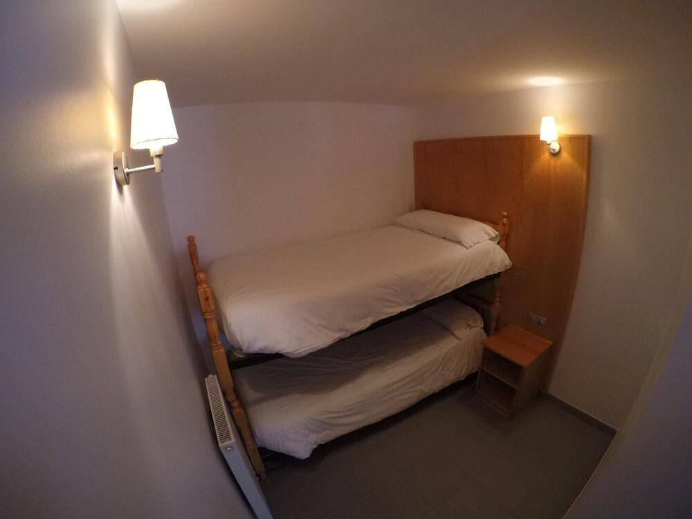 Foto de una habitación de Apartamentos Turísticos Roc Del Castell