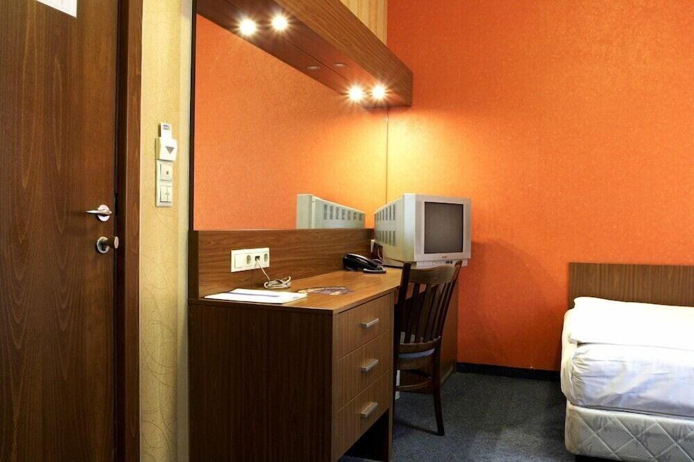 Foto de una habitación de DITER Hotel
