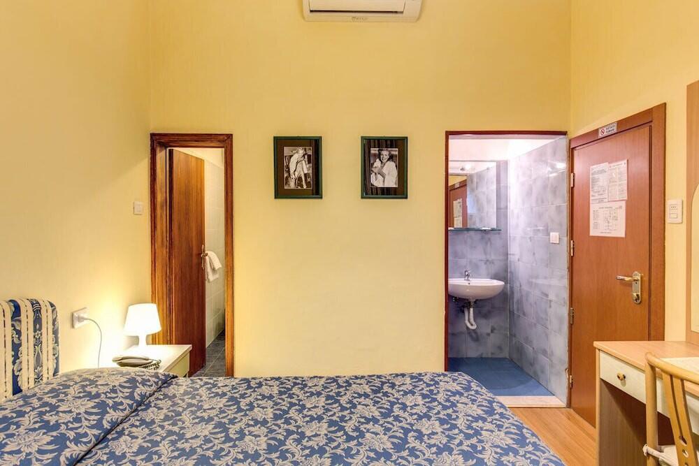 Foto de una habitación de Hotel Romagna