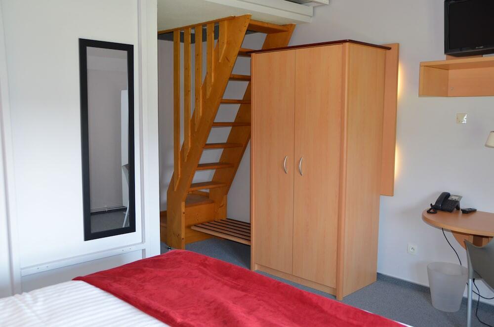 Foto de una habitación de Carré Py&amp;#039; Hôtel