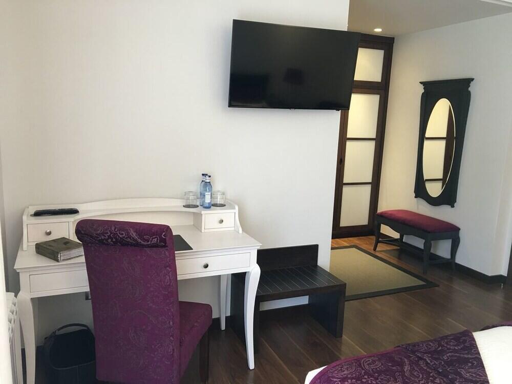 Foto de una habitación de Hotel Calzada