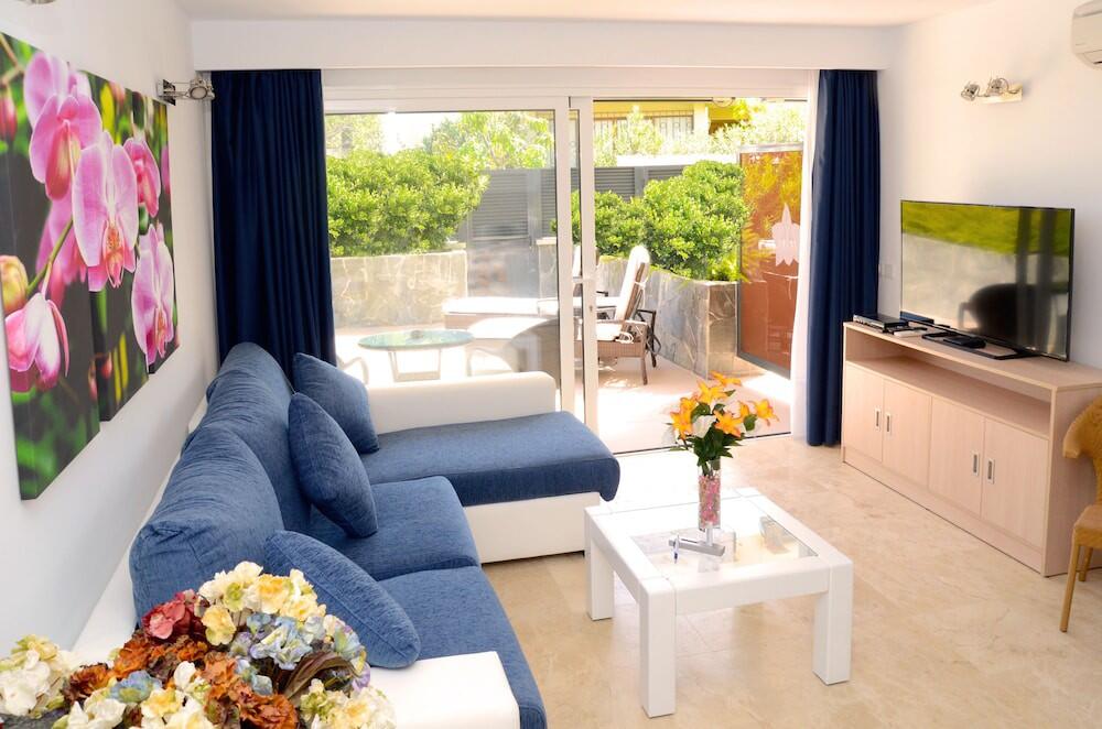Foto de una habitación de Apartamentos La Cataleya