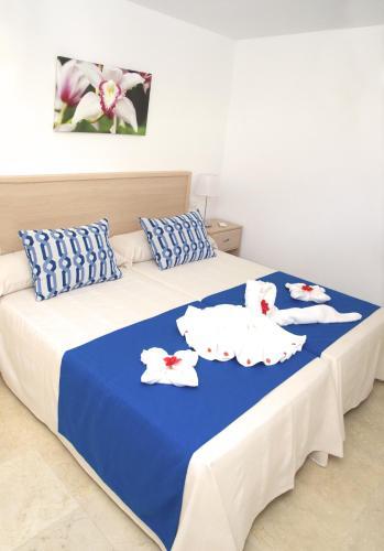 Foto de una habitación de Apartamentos La Cataleya