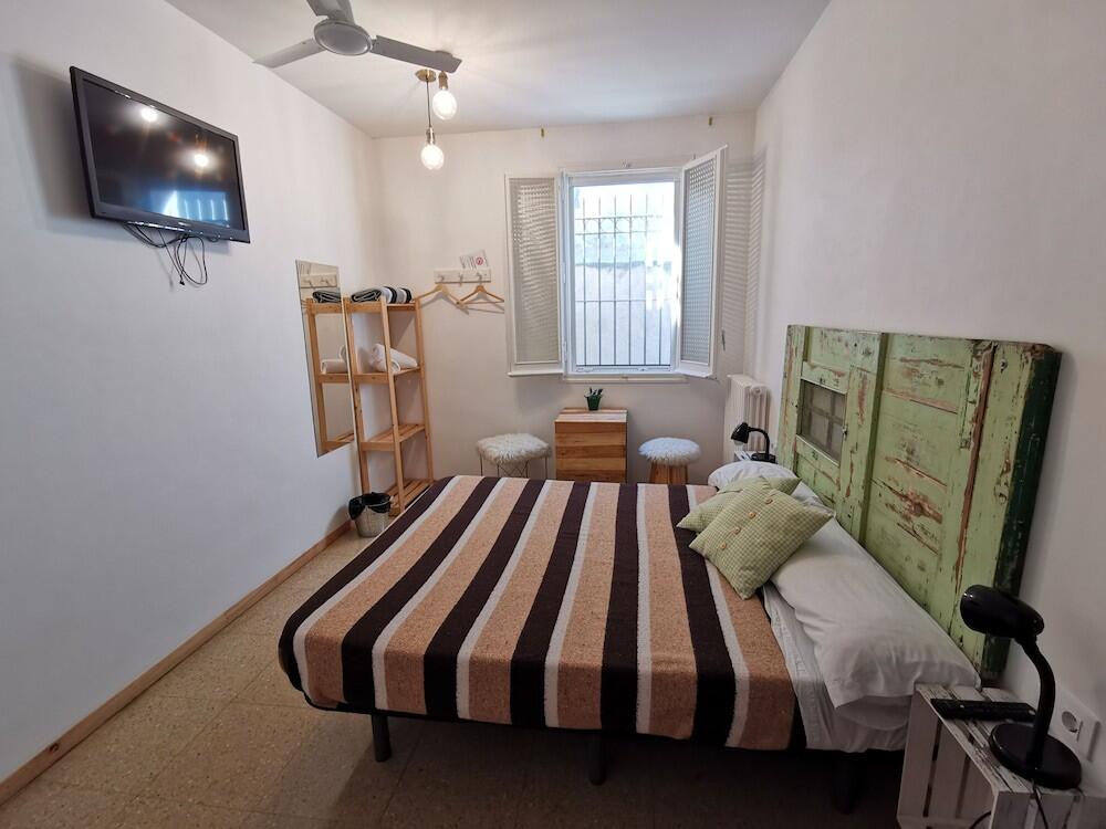 Foto de una habitación de Mucha Masia Hostel Rural-Urbà