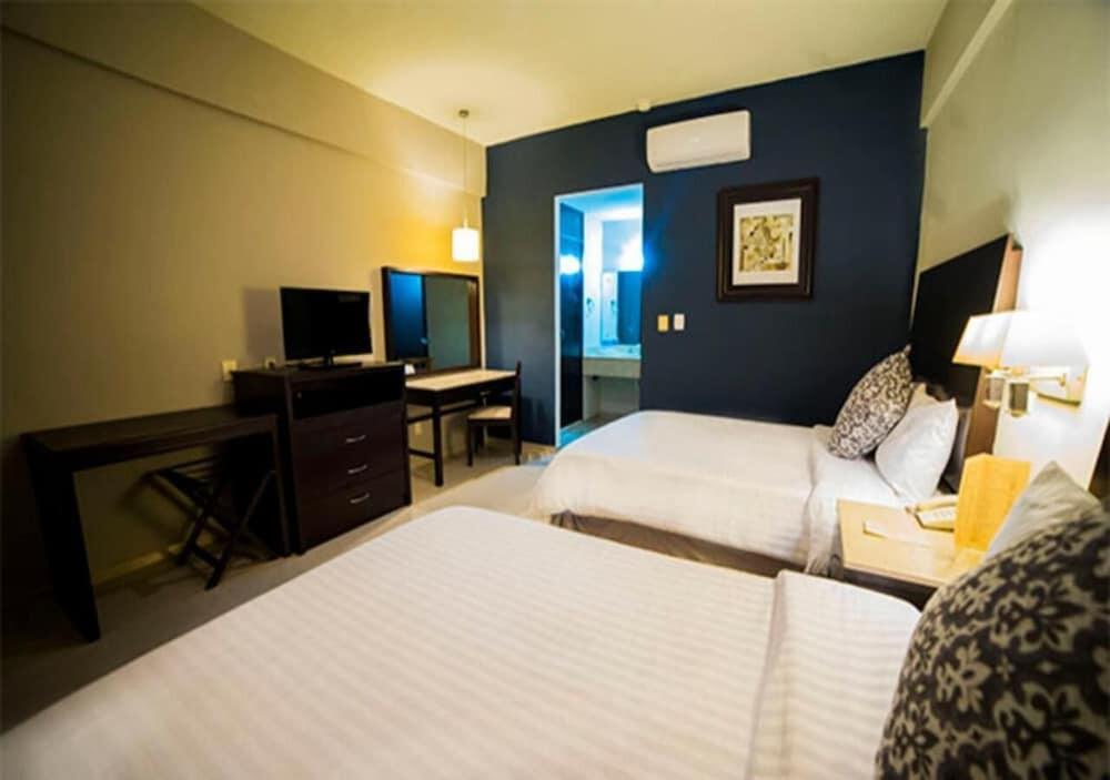 Foto de una habitación de Hotel Grand Marlon