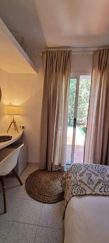 Foto de una habitación de Hotel S´Aguarda