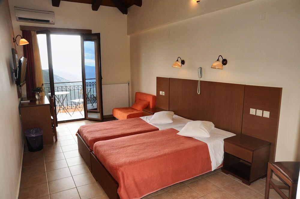 Foto de una habitación de Hotel Castri