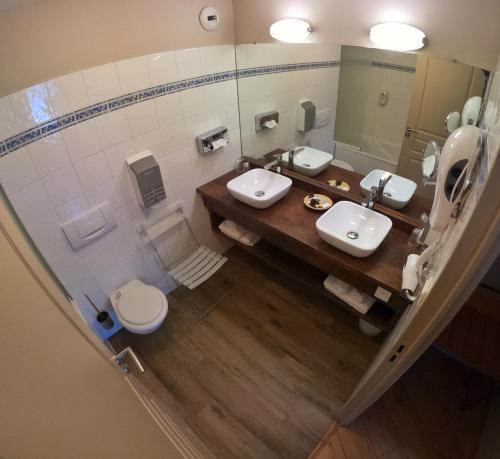 Foto del baño de Hôtel Les Arches