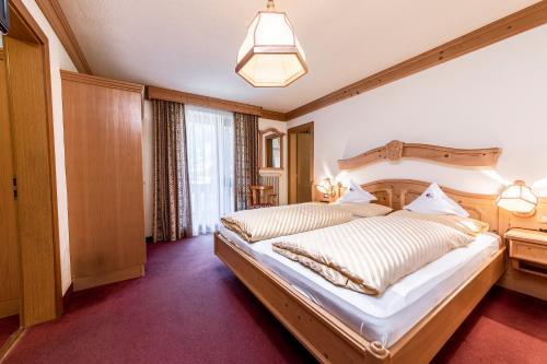 Foto de una habitación de Hotel Dolomiti