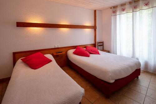 Foto de una habitación de Logis Hôtel Restaurant L&amp;#039;ancienne Auberge