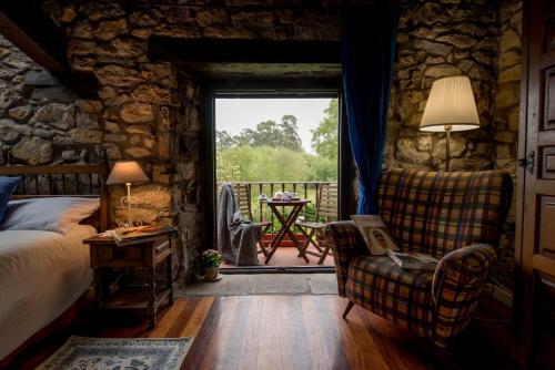Foto de una habitación de Hotel La Joyuca Del Pas