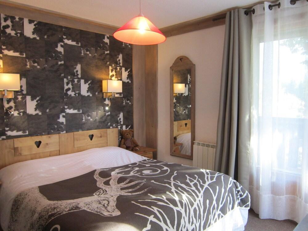 Foto de una habitación de Logis Hotel Gai Soleil