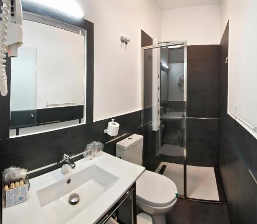 Foto del baño de Alhambra Suites