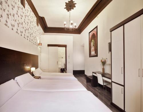 Foto de una habitación de Alhambra Suites