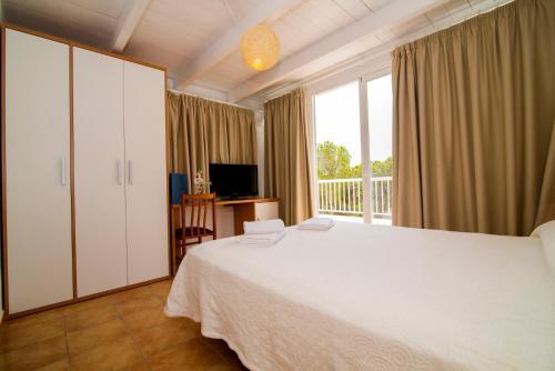 Foto de una habitación de Hostal Cala Boix