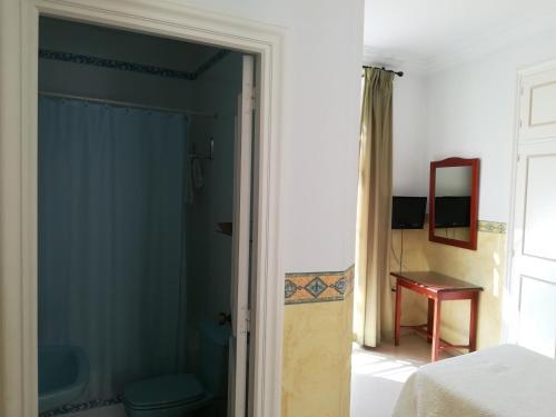 Foto de una habitación de Nuevo Hotel