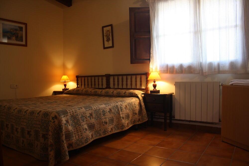Foto de una habitación de Casa Rural Masía La Safranera