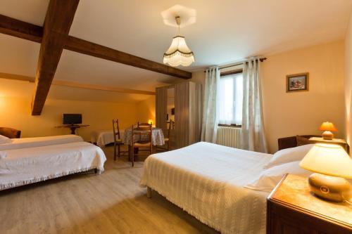 Foto de una habitación de Hotel Bon-Séjour