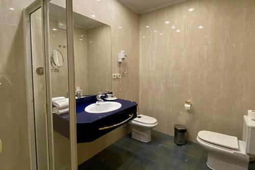 Foto de una habitación de Hotel Armiñe