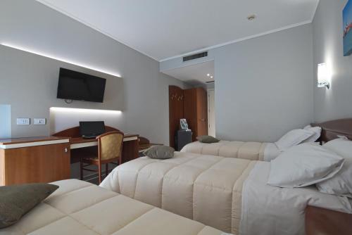 Foto de una habitación de Noventa Hotel