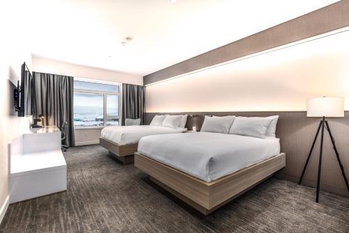 Foto de una habitación de Aqsarniit Hotel and Conference Centre