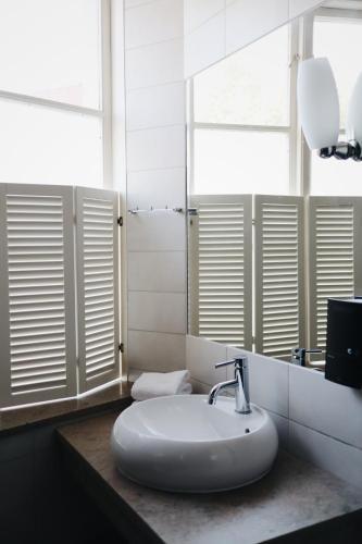 Foto del baño de Kalk Hotel