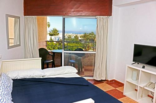 Foto de una habitación de Apartamentos Tamarindos