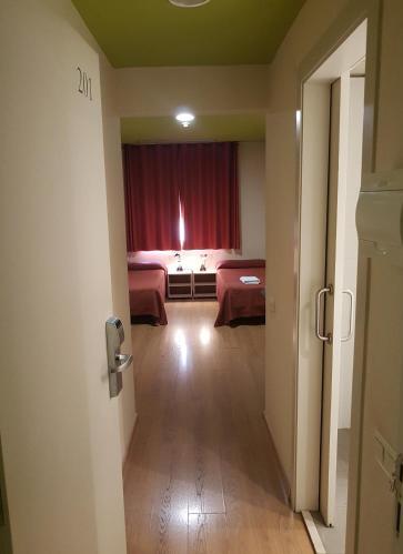 Foto de una habitación de Hotel Residència Erasmus Gracia