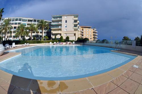 Foto de una habitación de Alquileres Vacacionales Les Pins Bleus - Antibes Juan Les Pins