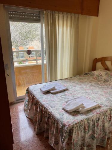 Foto de una habitación de Apartamentos Florazar II Ajhory