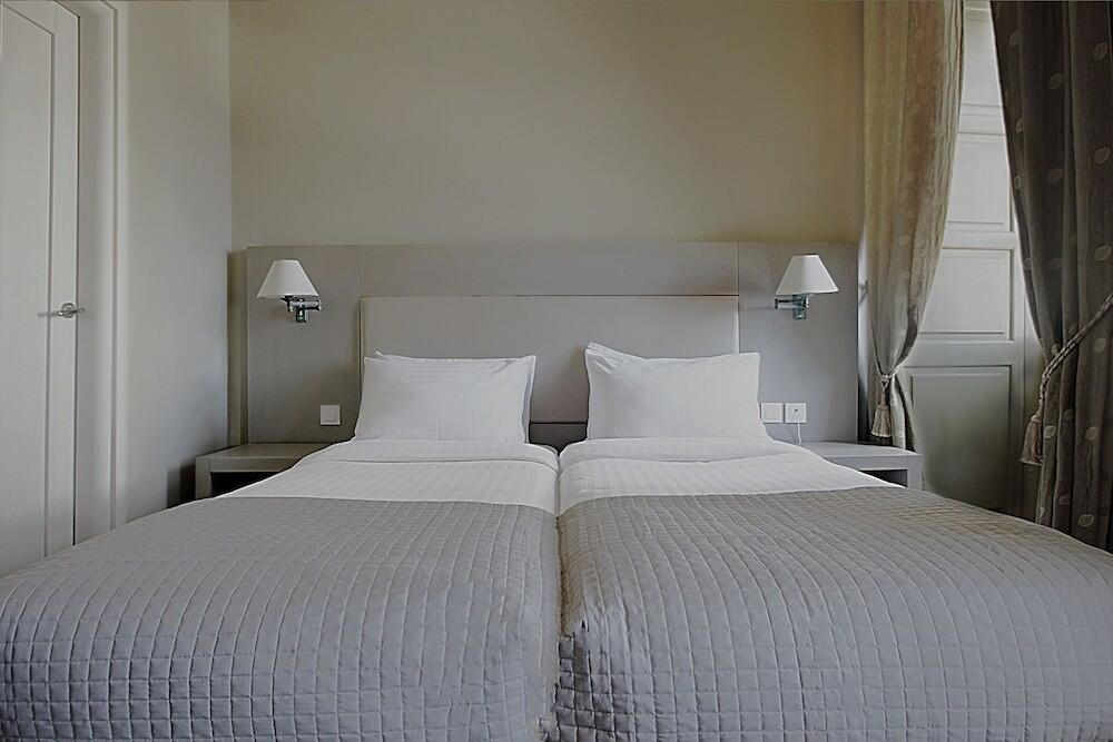 Foto de una habitación de Diogenis Hotel