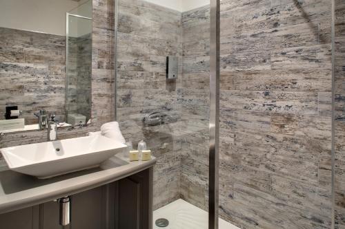 Foto del baño de Hotel Le Mas Des Sables