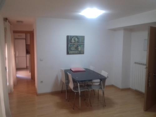 Foto de una habitación de Apartamentos Auhabitat Zaragoza, edificio de apartamentos turísticos con facilidad de parking