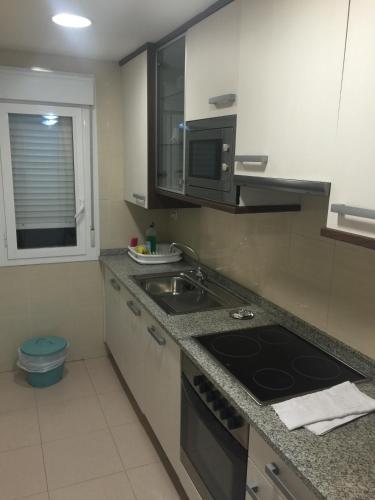 Foto de una habitación de Apartamentos Auhabitat Zaragoza, edificio de apartamentos turísticos con facilidad de parking