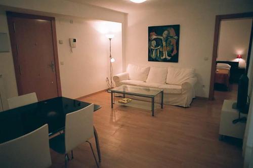Foto de una habitación de Apartamentos Auhabitat Zaragoza, edificio de apartamentos turísticos con facilidad de parking